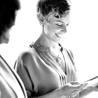 Woman looking at tablet device